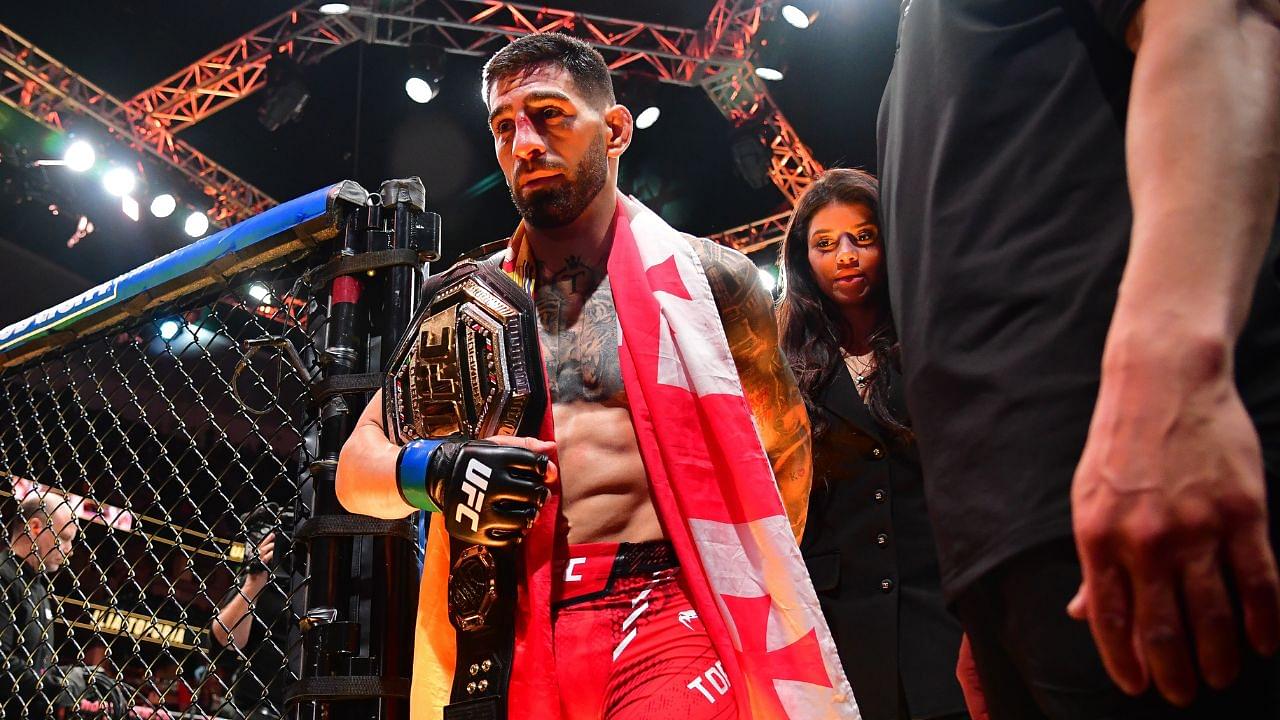 Ilia Topuria celebrates his championship victory against Alexander Volkanovski during UFC 298 at Honda Center.