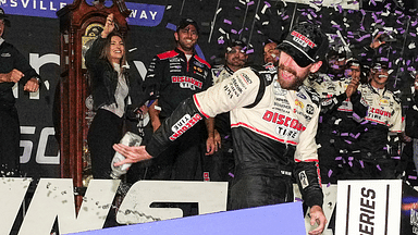 Nov 3, 2024; Martinsville, Virginia, USA; NASCAR Cup Series driver Ryan Blaney (12) celebrates his win in the Xfinity 500 at Martinsville Speedway. Mandatory Credit: Jim Dedmon-Imagn Images