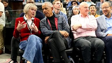 Mar 5, 2025; Inglewood, California, USA; Barack Obama, the 44th President of the United States talks to Connie Snyder, the wife of LA Clippers owner Steve Balmer during the first quarter between the Clippers and the Detroit Pistons at Intuit Dome. Mandatory Credit: Jason Parkhurst-Imagn Images