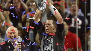 New England Patriots quarterback Tom Brady celebrates with the Vince Lombardi Trophy on the podium after defeating the Atlanta Falcons 34-28 in overtime in Super Bowl LI at NRG Stadium on Feb 5, 2017.