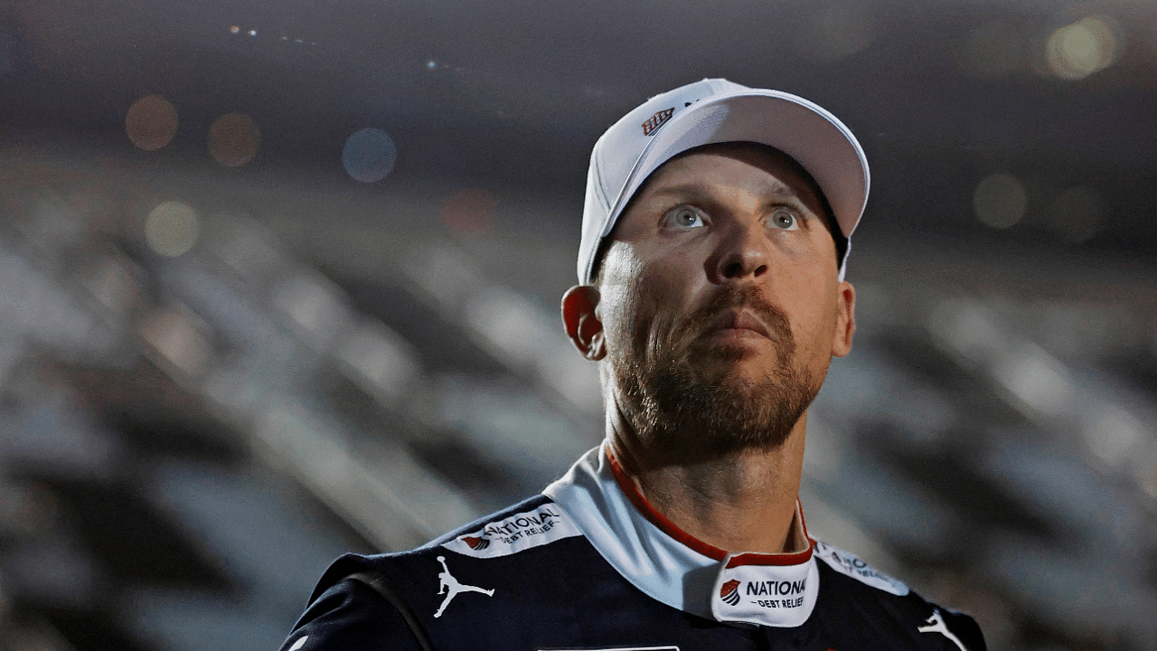 Feb 12, 2025; Daytona Beach, Florida, USA; NASCAR Cup Series driver Denny Hamlin (11) during qualifying for the Daytona 500 at Daytona International Speedway. Mandatory Credit: Peter Casey-Imagn Images