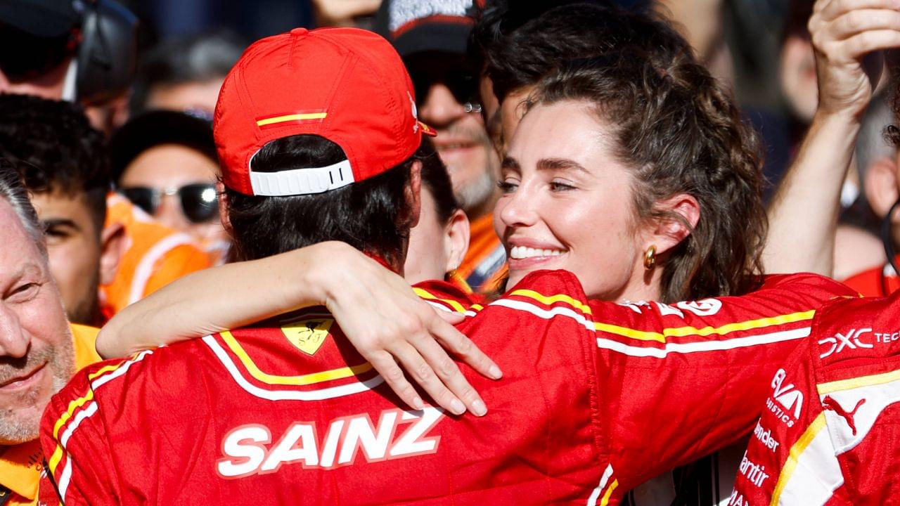 Rebecca Donaldson, girlfriend of Carlos Sainz of Spain and Scuderia Ferrari embrace after winning the 2024 Australian Grand Prix at Albert Park in Melbourne