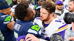 Dec 22, 2024; Seattle, Washington, USA; Seattle Seahawks quarterback Geno Smith (7) and Minnesota Vikings quarterback Sam Darnold (14) hug after the game at Lumen Field.