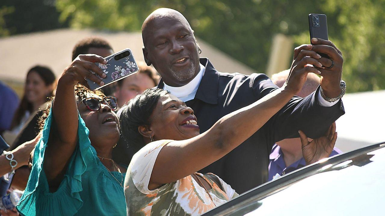 Michael Jordan takes a few photos with friends outside of The Michael Jordan Family Medical Clinic led by Novant Health. After taking part in a ribbon cutting ceremony for the new clinic opening off of Greenfield Street