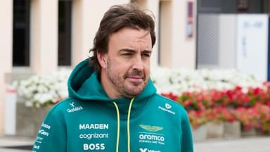 Fernando Alonso of Spain and Aston Martin Aramco F1 Team walks on the paddock during day one of the F1 Testing at Bahrain on February 26, 2025