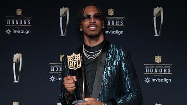 Washington Commanders quarterback Jayden Daniels poses with the Offensive Rookie of the Year award during Super Bowl LIX NFL Honors at Saenger Theatre. Mandatory