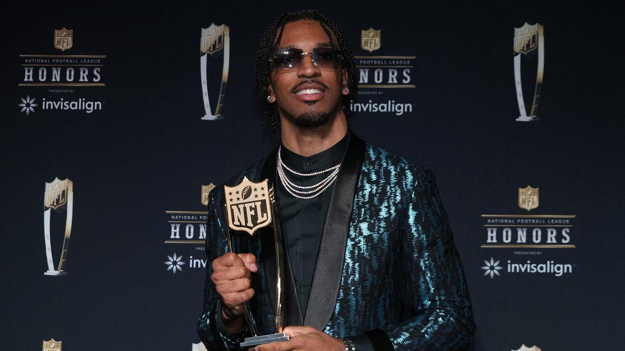 Washington Commanders quarterback Jayden Daniels poses with the Offensive Rookie of the Year award during Super Bowl LIX NFL Honors at Saenger Theatre. Mandatory