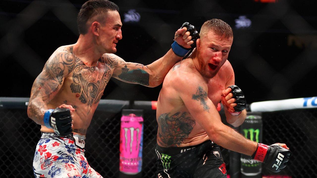 Max Holloway (blue gloves) fights Justin Gaethje (red gloves) during UFC 300 at T-Mobile Arena.