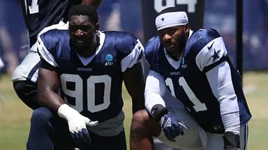 Jul 30, 2024; Oxnard, CA, USA; Dallas Cowboys defensive end DeMarcus Lawrence (90) and linebacker Micah Parsons (11) during training camp at the River Ridge Playing Fields in Oxnard, California.