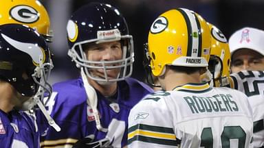 Green Bay Packers quarterback Aaron Rodgers (12) meets with Minnesota Vikings quarterback Brett Favre at midfield on Oct. 5, 2009, at the Metrodome in Minneapolis.