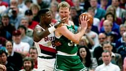 Boston Celtics forward Larry Bird (33) is defended by Portland Trail Blazers forward Jerome Kersey (25) at Memorial Coliseum