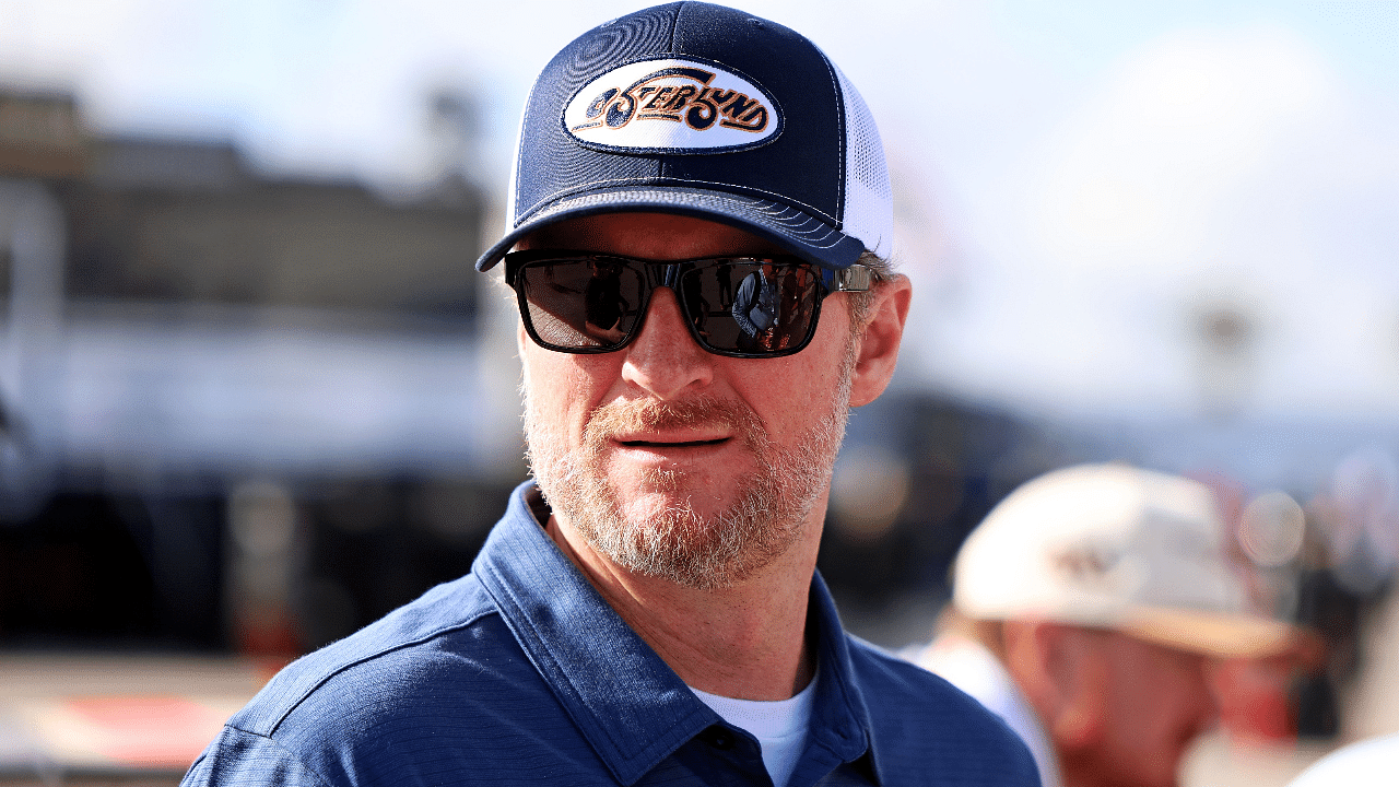 NASCAR team owner Dale Earnhardt Jr. looks on during practice for the Daytona 500 at Daytona International Speedway.