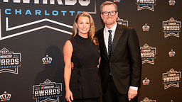 Nov 22, 2024; Charlotte, NC, USA; Dale Earnhardt Jr. and wife Amy during the NASCAR Awards Banquet at Charlotte Convention Center. Mandatory Credit: Jim Dedmon-Imagn Images