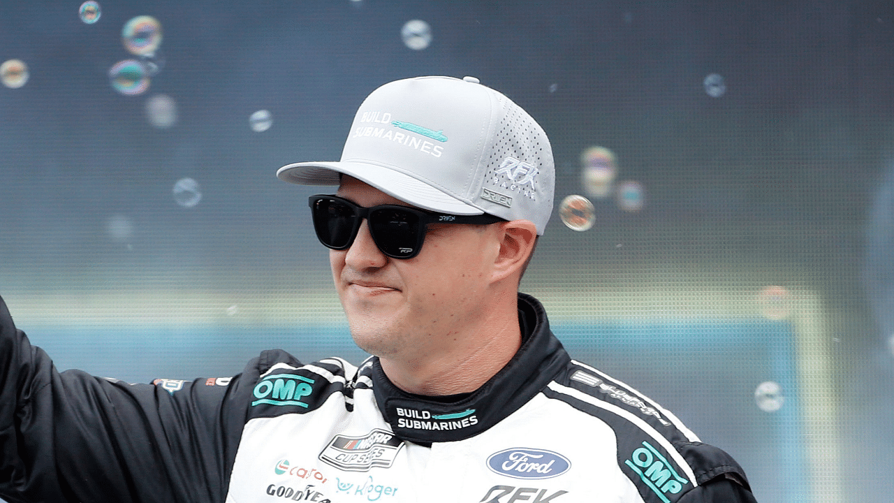 Mar 2, 2025; Austin, Texas, USA; NASCAR Cup Series driver Ryan Preece (60) walks out onto the stage for driver introductions before the EchoPark Automotive Grand Prix at Circuit of the Americas. Mandatory Credit: Jamie Harms-Imagn Images