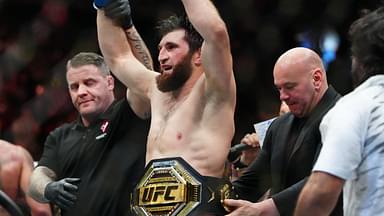 ; Magomed Ankalaev (blue gloves) reacts after defeating Alex Pereira (not pictured) during UFC 313 at T-Mobile Arena.