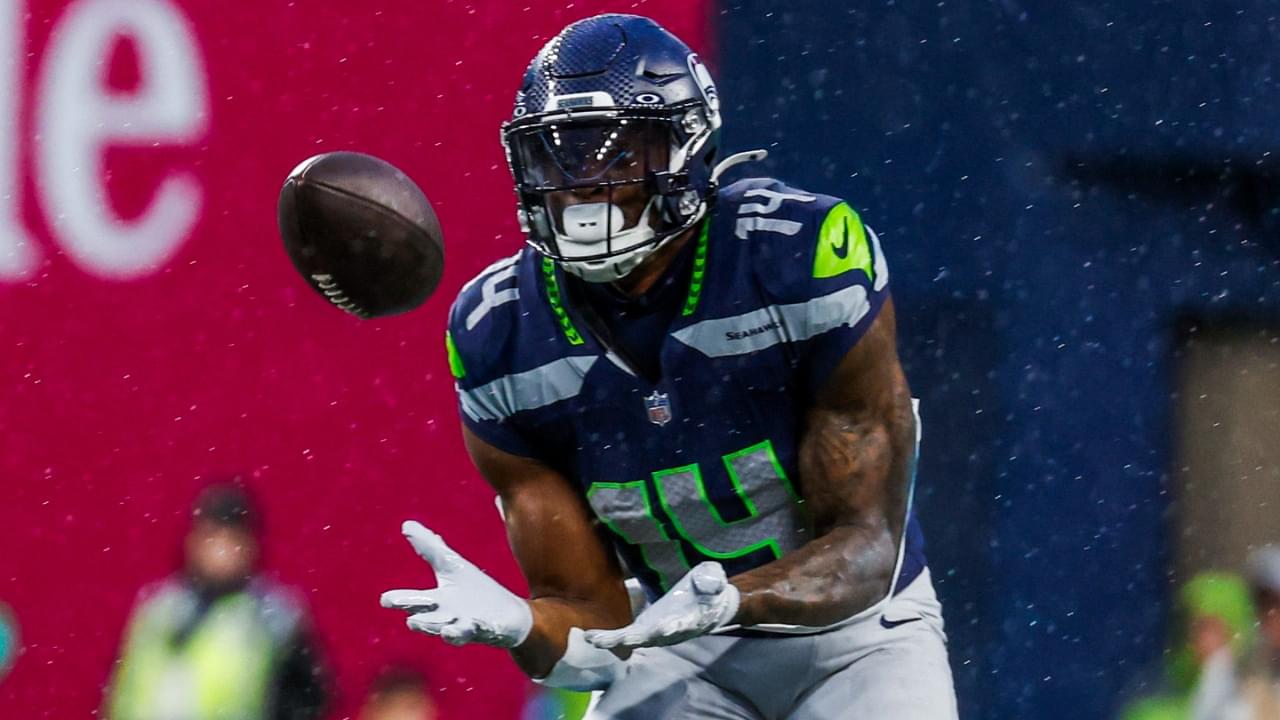 Nov 24, 2024; Seattle, Washington, USA; Seattle Seahawks wide receiver DK Metcalf (14) catches a pass against the Arizona Cardinals during the fourth quarter at Lumen Field.