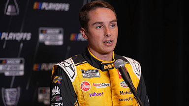 Sep 4, 2024; Charlotte, North Carolina, USA; Christopher Bell speaks to media members during the NASCAR Playoffs Media Day at the Charlotte Convention Center. Mandatory Credit: Jim Dedmon-Imagn Images