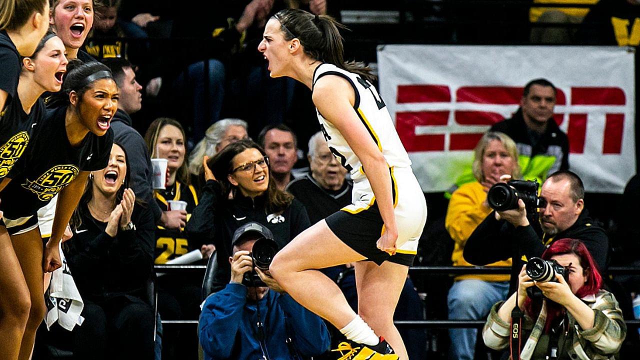 Iowa guard Caitlin Clark reacts after drawing a foul during a NCAA Big Ten Conference women's basketball game against Indiana