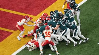 Philadelphia Eagles quarterback Jalen Hurts (1) rushes the ball for a touchdown against the Kansas City Chiefs during the first quarter in Super Bowl LIX at Caesars Superdome.