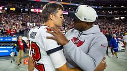 Tampa Bay Buccaneers quarterback Tom Brady (12) celebrates with offensive coordinator Byron Leftwich after defeating the Arizona Cardinals in overtime at State Farm Stadium.