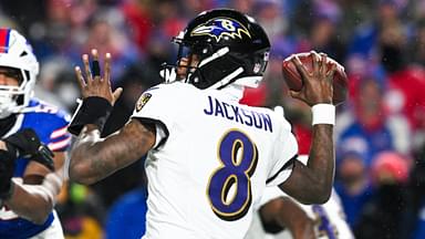 Jan 19, 2025; Orchard Park, New York, USA; Baltimore Ravens quarterback Lamar Jackson (8) throws the ball during the fourth quarter against the Buffalo Bills in a 2025 AFC divisional round game at Highmark Stadium.