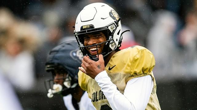 Colorado's Shedeur Sanders smiles before taking a snap during a Colorado football spring game at Folsom Field in Boulder, Colo., on Saturday, April 27, 2024.