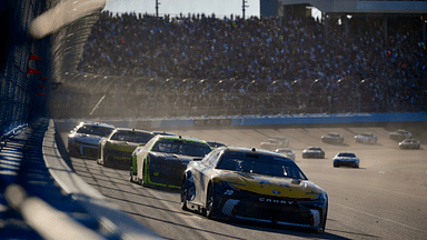 Nov 10, 2024; Avondale, Arizona, USA; NASCAR Cup Series driver Christopher Bell (20) leads the restart during the Cup Series championship race at Phoenix Raceway. Mandatory Credit: Gary A. Vasquez-Imagn Images