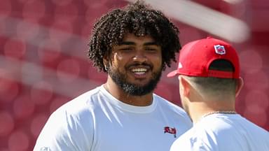 Dec 8, 2024; Tampa, Florida, USA; Tampa Bay Buccaneers offensive tackle Tristan Wirfs (78) and quarterback Baker Mayfield (6) warms up before a game against the Las Vegas Raiders at Raymond James Stadium.