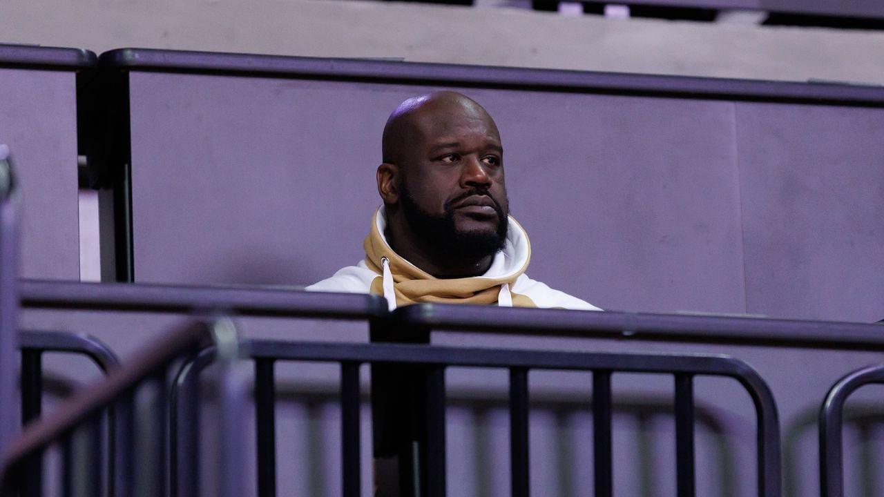 Former NBA player Shaquille O'Neal sits courtside during the first half between the Florida Gators and the LSU Tigers at Exactech Arena at the Stephen C. O'Connell Center