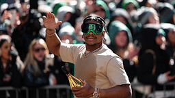 Nolan Smith Jr waves to fans during the Super Bowl LIX championship parade and rally.