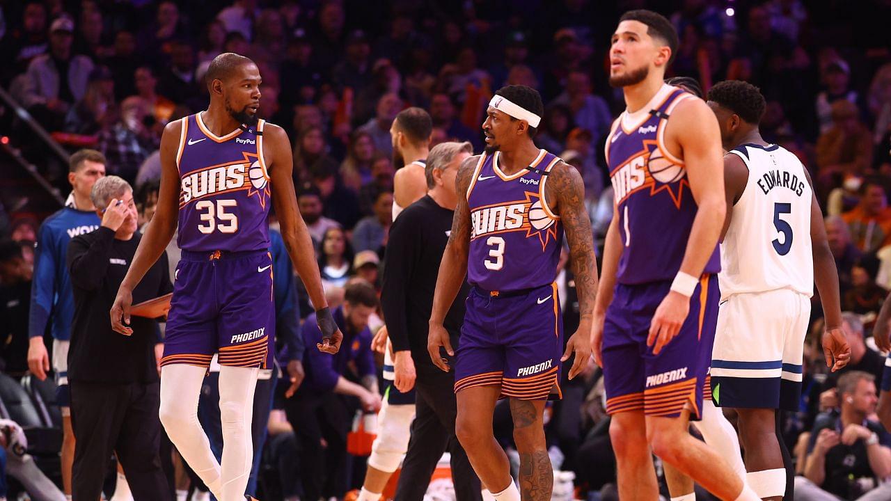 Phoenix Suns forward Kevin Durant (35) with guard Bradley Beal (3) and Devin Booker (1) against the Minnesota Timberwolves at Footprint Center.