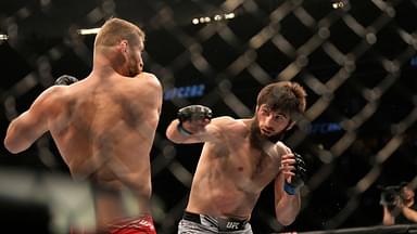 Jan Blachowicz battles Magomed Ankalaev in their Light Heavyweight fight during the UFC 282 event at T-Mobile Arena on December 10, 2022 in Las Vegas, Nevada, United States