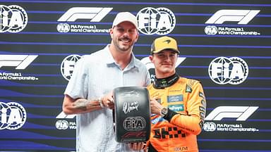 Qualifying In Melbourne, Australia, on March 15, 2025, Kyle Chalmers of Australia and Olympic Swimming Champion presents the Pirelli Pole Position award to Lando Norris of Great Britain and the McLaren F1 Team during Qualifying ahead of the F1 Grand Prix of Australia at Albert Park Circuit