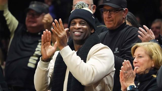 Jan 13, 2024; Boulder, Colorado, USA; Colorado Buffaloes football head coach Deion Sanders cheers in the second half of the game against the USC Trojans at the CU Events Center.