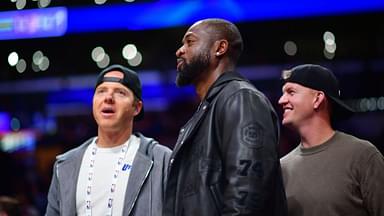 Utah Jazz minority owner Dwyane Wade with majority owner Ryan Smith (left) watch game action against the Los Angeles Lakers during the second half at Crypto.com Arena