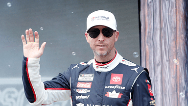 NASCAR Cup Series driver Denny Hamlin (11) walks out onto the stage for driver introductions before the EchoPark Automotive Grand Prix at Circuit of the Americas.