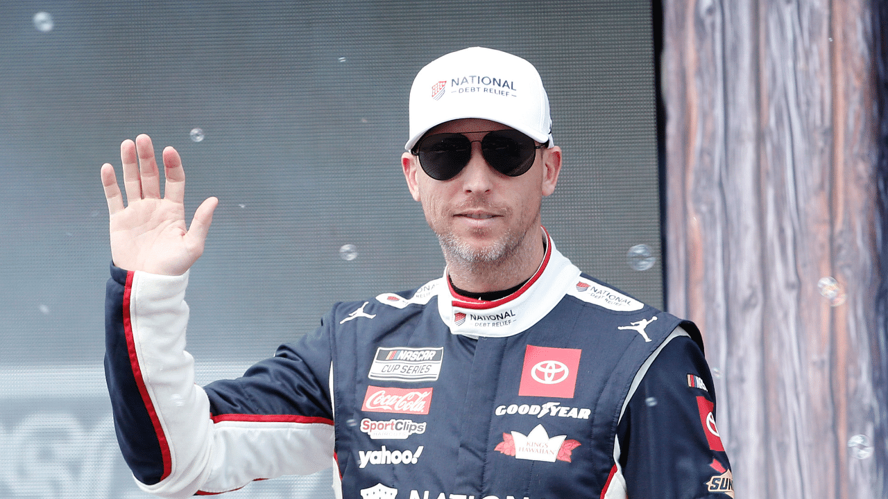 NASCAR Cup Series driver Denny Hamlin (11) walks out onto the stage for driver introductions before the EchoPark Automotive Grand Prix at Circuit of the Americas.