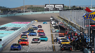 NASCAR Cup Series driver Chase Elliot (9) races NASCAR Cup Series driver Tyler Reddick (45) and the field off of pit road during the Straight Talk Wireless 400 at Homestead-Miami Speedway.