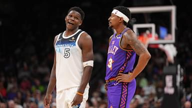 Minnesota Timberwolves guard Anthony Edwards (5) and Phoenix Suns guard Bradley Beal (3) talk during the second half at Footprint Center.