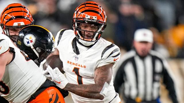 Cincinnati Bengals wide receiver Ja'Marr Chase (1) runs with a catch in the fourth quarter of the NFL Week 18 game between the Pittsburgh Steelers and the Cincinnati Bengals at Acrisure Stadium in Pittsburgh on Saturday, Jan. 4, 2025. The Bengals won 19-17 to finish the regular season at 9-8.