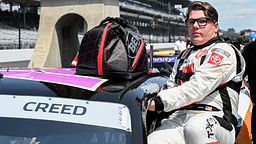 NASCAR Xfinity Series driver Sheldon Creed (18) climbs into his car Saturday, July 20, 2024, during qualifying for the Pennzoil 250 at Indianapolis Motor Speedway.