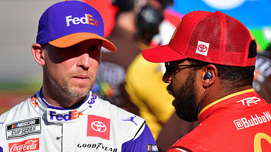 Oct 15, 2022; Las Vegas, Nevada, USA; NASCAR Cup Series driver Denny Hamlin (11) speaks with driver Bubba Wallace (45) during practice at Las Vegas Motor Speedway. Mandatory Credit: Gary A. Vasquez-Imagn Images