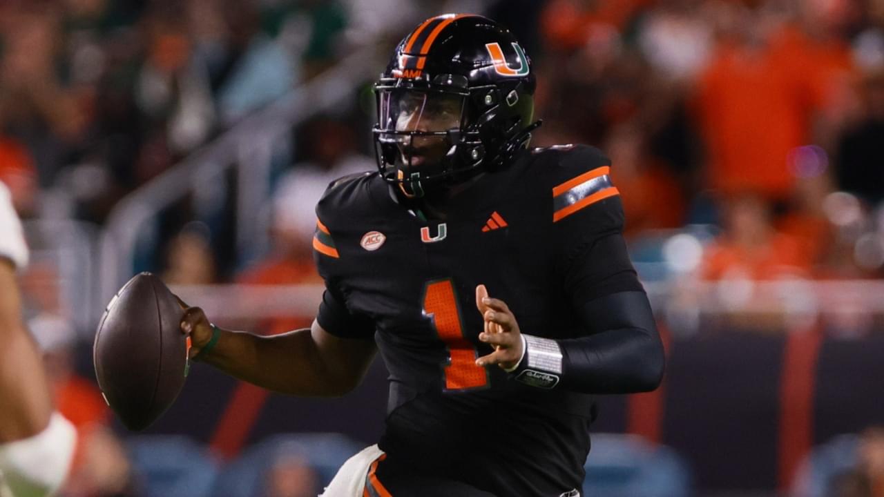 Oct 26, 2024; Miami Gardens, Florida, USA; Miami Hurricanes quarterback Cam Ward (1) runs with the football against the Florida State Seminoles during the third quarter at Hard Rock Stadium.