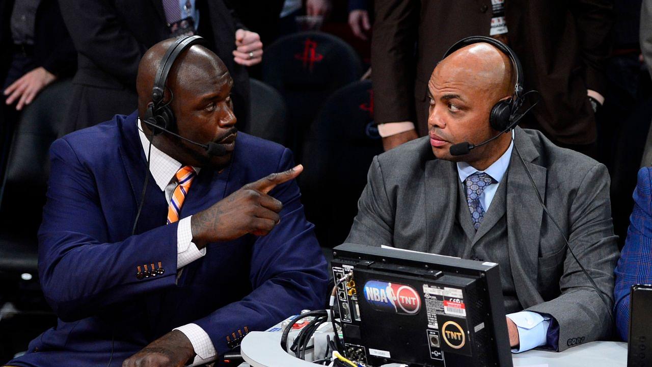 TNT broadcaster Shaquille O'Neal (left) and Charles Barkley talk during the 2013 NBA All-Star slam dunk contest at the Toyota Center