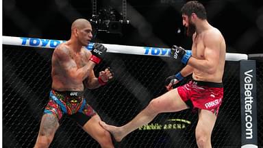 ; Alex Pereira (red gloves) fights Magomed Ankalaev (blue gloves) during UFC 313 at T-Mobile Arena.