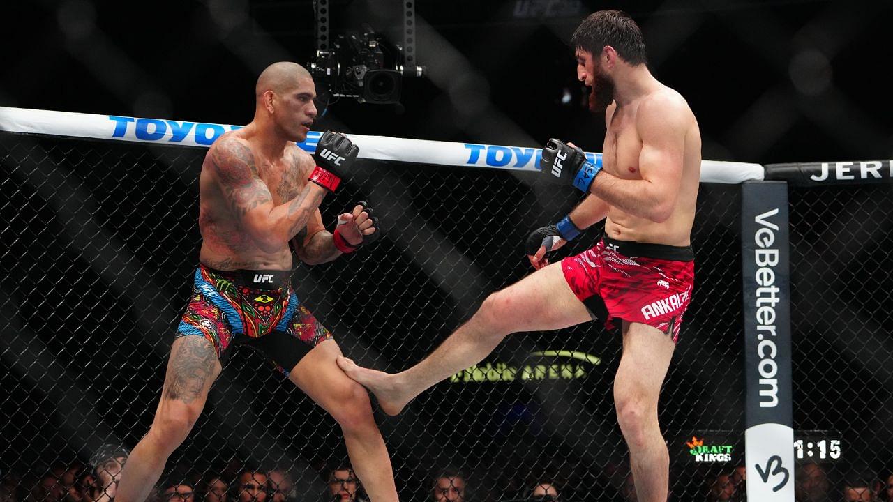 Alex Pereira (red gloves) fights Magomed Ankalaev (blue gloves) during UFC 313 at T-Mobile Arena.