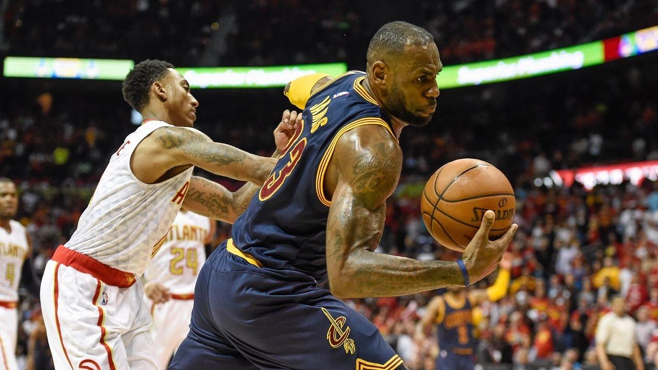 Cleveland Cavaliers forward LeBron James (23) is fouled by Atlanta Hawks guard Jeff Teague (0) during the second half in game three of the second round of the NBA Playoffs at Philips Arena. The Cavaliers defeated the Hawks 121-108.