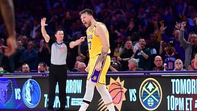 Los Angeles Lakers guard Luka Doncic (77) reacts after scoring a basket against the New York Knicks during overtime at Crypto.com Arena