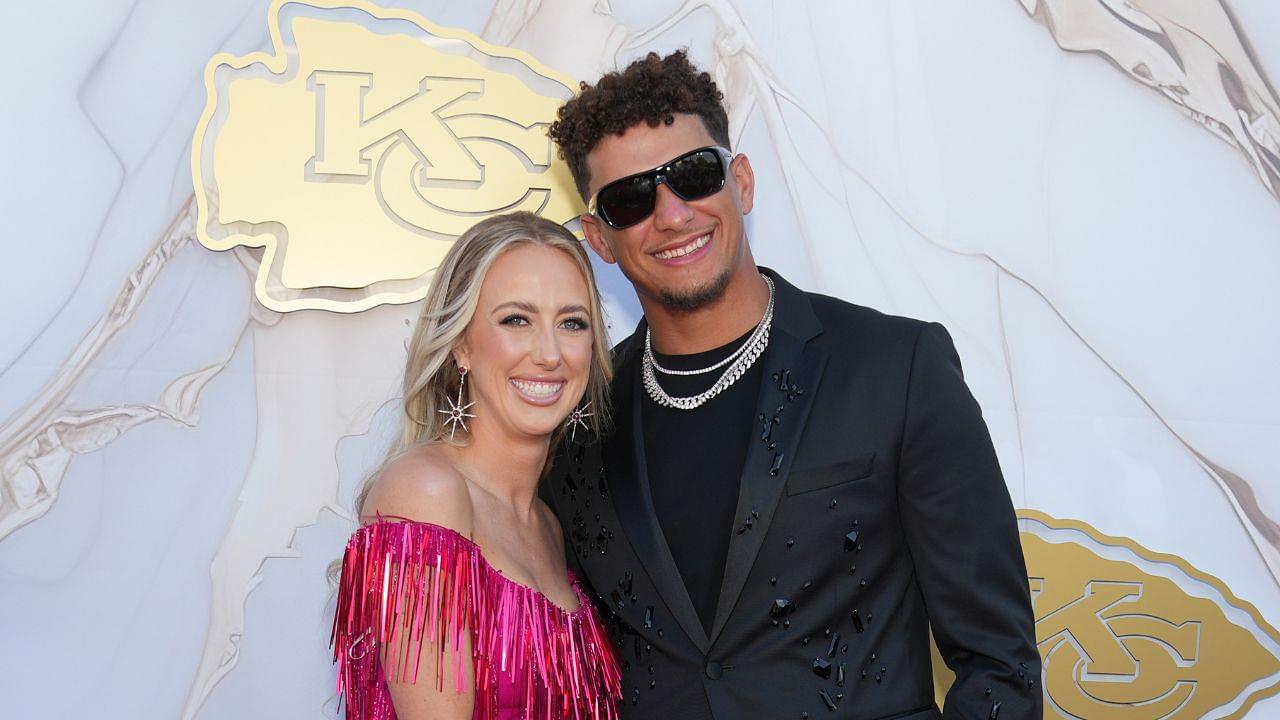 Kansas City Chiefs quarterback Patrick Mahomes and wife Brittany pose for a photo on the red carpet at the Nelson Art Gallery.