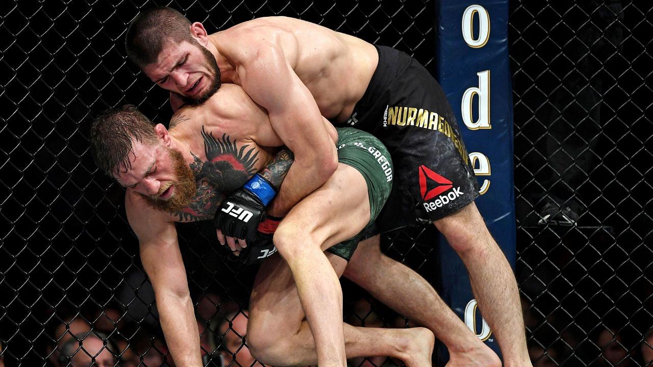 Khabib Nurmagomedov (red gloves) fights Conor McGregor (blue gloves) during UFC 229 at T-Mobile Arena.